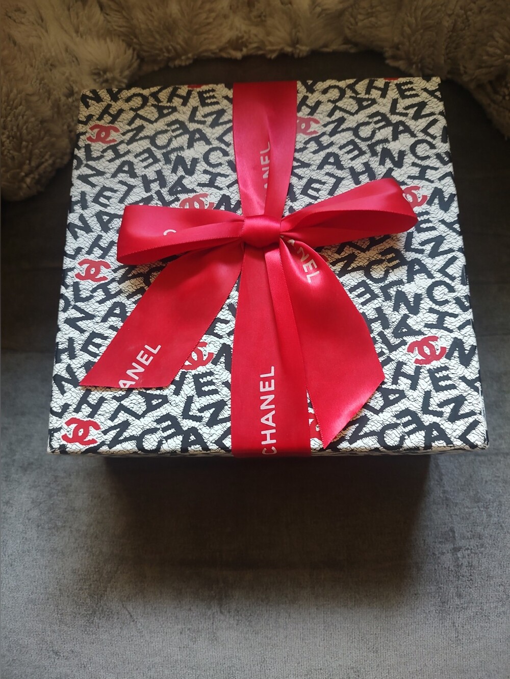 CHANEL Black & White Logo Box with Red Branded Ribbon